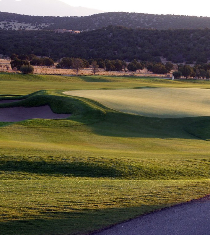 Image of Paa-Ko Ridge Golf Course overseeing the course as the sun sets.